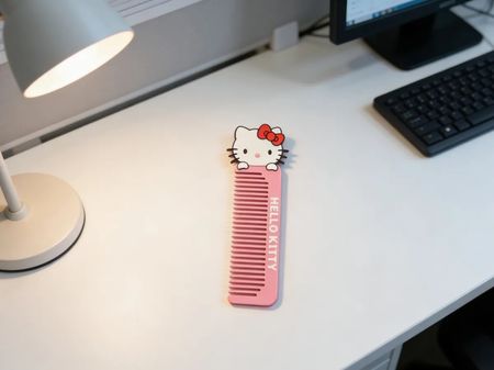 Foto de Peine kawaii con gatita y moño rojo